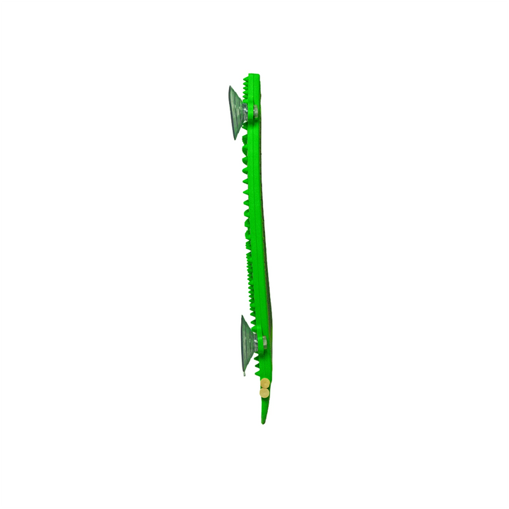 Divot Board MINI edge-on side profile showing the slim curved deck, two clear suction cups and wooden tees