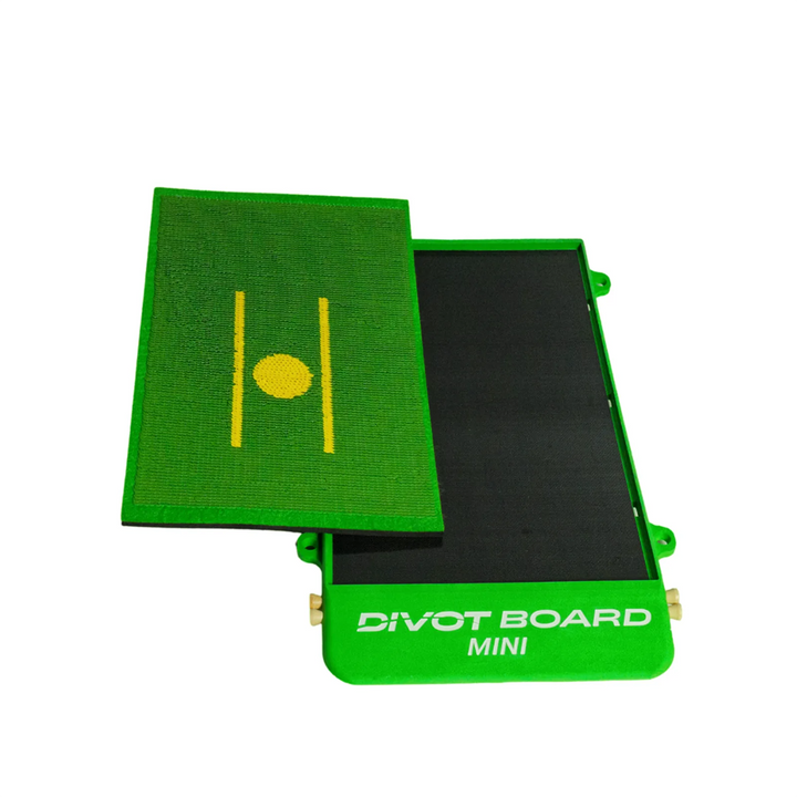 Divot Board MINI with the turf pad lifted off, showing the black base tray underneath